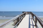 Boardwalk beach access located steps from the pool and your condo
